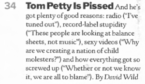 2002-11-14_RollingStone909-01
